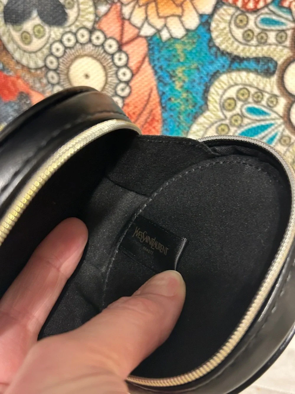 Yves Saint Laurent Black Round Leather Travel Case with Gold Tag